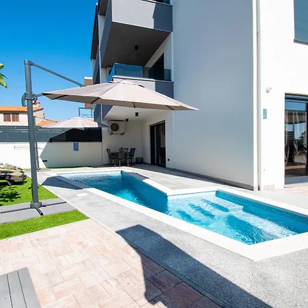 Rose With A Pool In Apartment Medulin